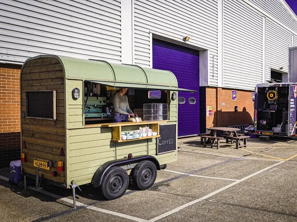 The Gallop & Grind coffee trailer serving staff at a corporate workplace event